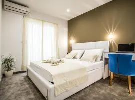 Holiday Apartments & Rooms