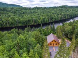 Chalet bois rond aux paysages uniques avec Spa !, chalet i Lac-aux-Sables