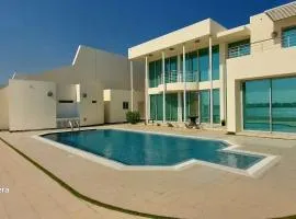 Family friendly house in Bahrian、Durrat Al Bahrainのコテージ