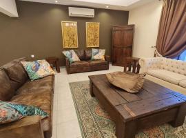 Unique Furnished Holiday Villa Bahrain, cabaña o casa de campo en Jannūsān