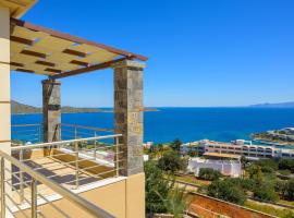 Elounda Blue Waves Residence, cabaña o casa de campo en Elounda