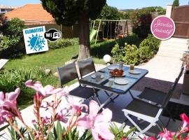 Bas de villa jardin plein sud proche mer clim-Wifi, hôtel à Saint-Mandrier-sur-Mer