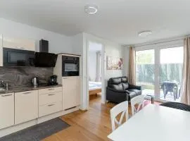 Modern apartment with tiny garden near city center