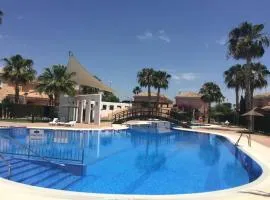 House sleeps 6, large pool walk to beach