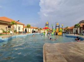 منتجع الجزيرة الخضراء, hotel dengan kolam renang di Al Hada