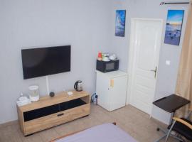 Studio cosy et moderne, жилье для отдыха в Ломе