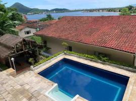 Casa gigante com vista para o mar e piscina, casa rústica em São Vicente