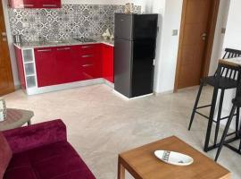 Studio Rouge Cosy à Dar Lili Djerba, būstas prie paplūdimio mieste Mezraya