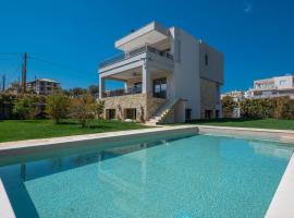 Sea Wind Luxury Villa with Private Heated Pool Kassandra Halkidiki, feriebolig i Néa Fókaia