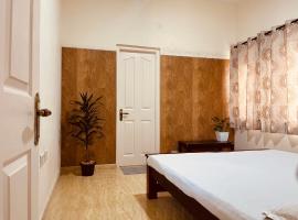 쿠누르에 위치한 호텔 Nilgiri Comfort Stay