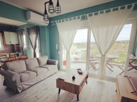 Tararas apartments, ваканционно жилище на плажа в Неа Миханиона