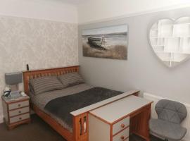 Tranquillity, habitació en una casa particular a Southbourne