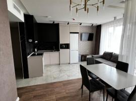 Апартаменти SunVI в ЖК Сонячний Квартал, hotel con alberca en Golubinoye