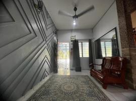 Cahaya Homestay & Free WIFI, отель с парковкой в городе Jeram