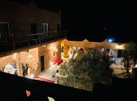 Dar Talmoudi ,Traditional Riad, Local Food, Camel , Desert Excursions