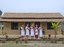 Tharu Community Lodge, familjehotell i Kawasoti