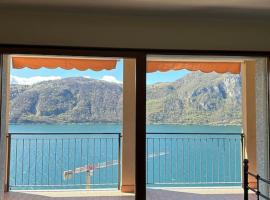 Monolocale con vista lago، فندق في كامبيوني دي إيطاليا