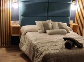 Duerme a gusto - Tu habitación acogedora en Torredonjimeno: Torredonjimeno'da bir ucuz otel