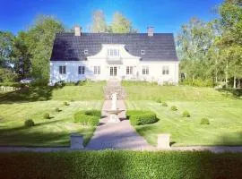 Prästgårdsidyll Gästhus med Boutique-känsla