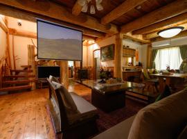 貸温泉別荘Clover天城杉のログハウス伊豆高原, hotel di Ito