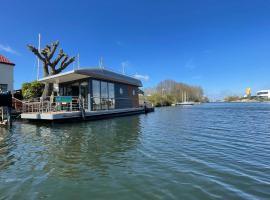 Houseboat Kamperland, vakantiewoning aan het strand in Kamperland