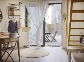 Duplex dans village avec jardin