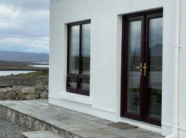 Apartment at Island Cottage, Inishnee, Roundstone, vakantiewoning aan het strand in Galway