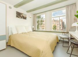 The Red Ox - Super Central Canal View Rooms, hotel in Amsterdam