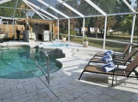 Peachland getaway with pool and tiki bar