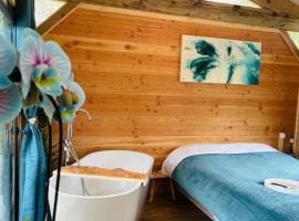 Chalet Dalo cosy spa privé, aluguel de temporada em Roussayrolles