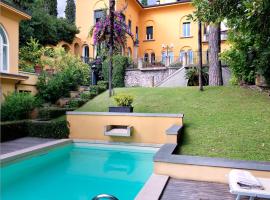 Villa Ella in Luxury Resort, feriebolig i Gardone Riviera