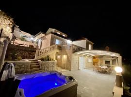 Villa Fjera with a sea view, hot tubs, terrace, BBQ, hotel with jacuzzis in Pučišća