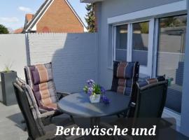 Bude im Windrosenweg, villa i Cuxhaven