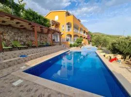 Apartmani Tolj