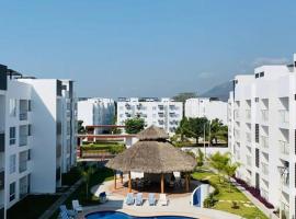 Departamento en Manzanillo con Alberca，曼薩尼約的附設泳池的飯店