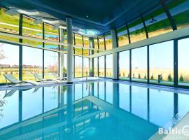Apartamenty BalticON Westin House -luksusowy 70m2 , basen pool, sauna, parking inklusive