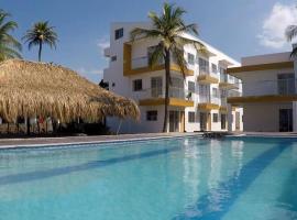 Apto 1er piso frente a la playa y con piscina, отель в городе Сан-Бернардо-дель-Вьенто