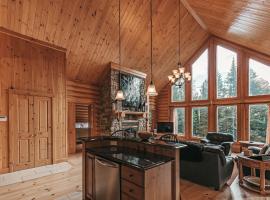 5-Bedroom Getaway with Sauna, BBQ, and Game Room, hotel in Mille-Isles