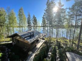 Luxury guesthouse, beachfront sauna, mökki kohteessa Jyväskylä