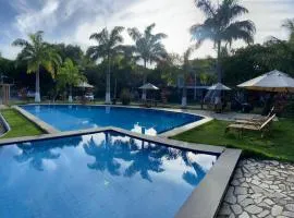 Casa aconchegante em condomínio arborizado