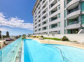 Ramada Suites by Wyndham Nautilus Orewa, apartment in Orewa