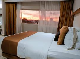 Hotel Soleil Business Class，位于莱昂德尔巴乔机场 - BJX附近的酒店