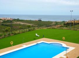 Small Oasis Nelson Mandela Apartment with sea view, two bedrooms, parking, terrace and pool, διαμέρισμα σε Manilva