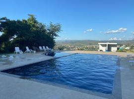 Casa em Escarpas do Lago, alojamento para férias em Capitólio