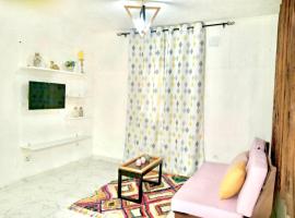 G&ecirc;na house, hytte i Douala