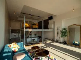 Loft de luxe le Chic, Grand jacuzzi, Vue port de plaisance