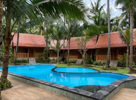 Villa Lova Sambirenteng, ξενοδοχείο με πισίνα σε Gretek