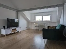 Le Vauban - appartement 2 chambres, salon, cuisine équipée, parking et wifi gratuit