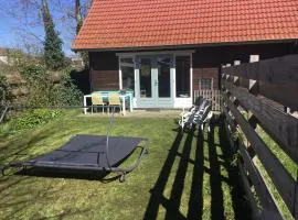 Huisje met jacuzzi en Sauna