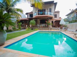 Casa a 50m da Praia de Itacoatiara Niteroi RJ, holiday home in Niterói